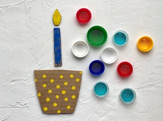 3d application training made of recycled cardboard and plastic lids, cake 