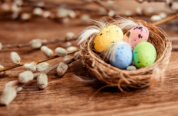 Christian holiday. A painted quail egg lies in the nest. 