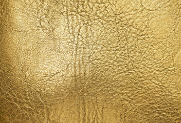 Gold wrinkled artificial leather texture background