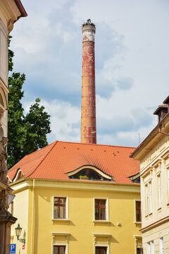 Roof of a yellow house with chimneys in Litoměřice Leitmeritz in the Czech Republic