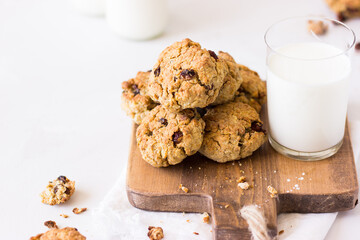 oatmeal cookies and milk on a white background. healthy food for baby breakfast