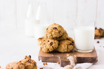 oatmeal cookies and milk on a white background. healthy food for baby breakfast
