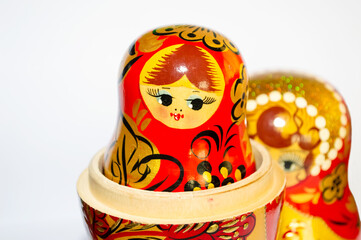 close-up - beautiful traditional Russian wooden toy doll - matryoshka, disassembled