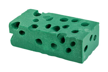 A green floral foam brick is used, insulated on a white background. Floral Sponge.