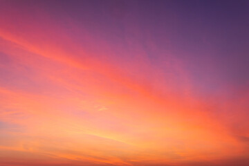 sunset sky in the evening with colorful red sunlight background 