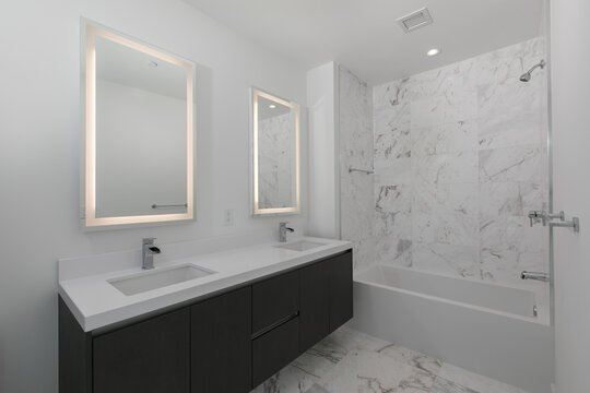 Modern Double Sink bathroom marble stone tub lighted mirrors