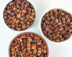 Roasted coffee beans in pots