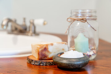 Natural personal care items on a wooden bathroom counter