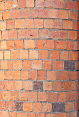 Texture of brick wall. new brickwork. Samples of wall or fence are presented at exhibitions. Orange brick close up.