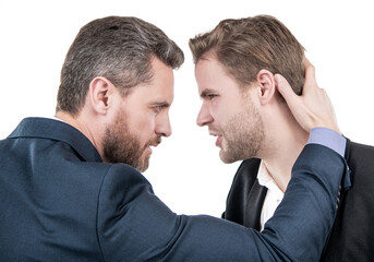 two businessmen starring to each other in business conflict, bad work