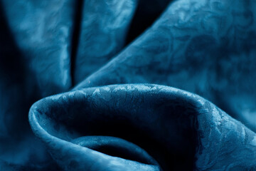 blue with patterns satin fabric. Place for text