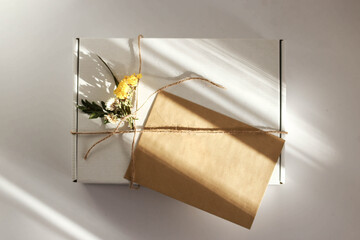 Gift wrap with envelope in white and beige colors
