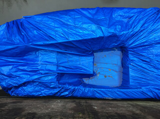 boat in blue plastic
