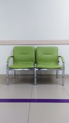 metal chairs with bright green leather seats