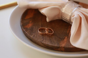 wedding rings on a pillow
