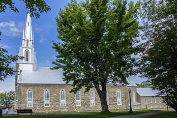 Fototapeta premium View of Church of St. Patrick (Paroisse-de-Saint-Patrice, 1855) in Village Riviere-du-Loup (200 kilometers east of Quebec City). Quebec province, Canada.