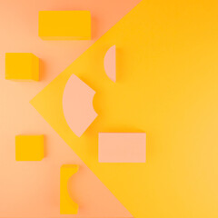 Abstract pink yellow wooden geometric construction kit figures: rectangles,square,segments of...