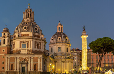 Europe, Italy, Rome. Blu hour with the Trajan's column and the two neighbouring churches