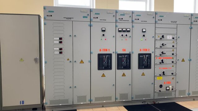 Cells in a distribution substation. The inscriptions in Russian mean the name of the equipment