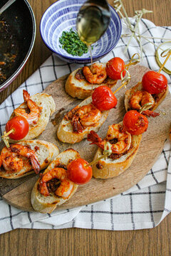 Garlic shrimp pincho for tapas dinner party at home. Homemade basque pintxo workshop. Spanish food