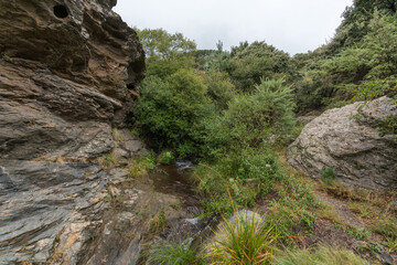 Fototapeta na wymiar stream of water in the mountain