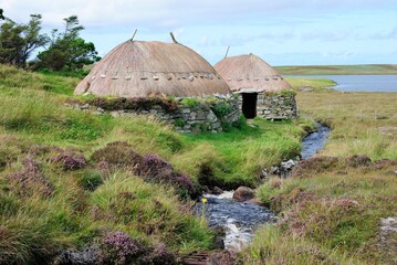 Traditional old blackhouses and beautiful and peaceful landscape  on the Isle of Lewis in the Outer Hebrides of Scotland, UK