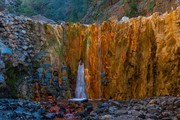 Foto auf Acrylglas Kanarische Inseln Cascada de Los Colores at caldera de Taburiente at La Palma, Canary islands, Spain
