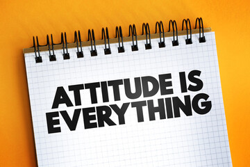 Attitude Is Everything text quote on notepad, concept background