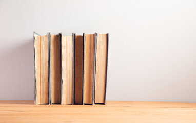 Collection of books on wooden table
