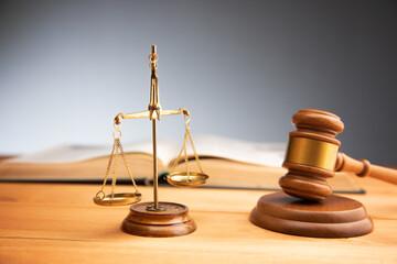 scales of justice with gavel and book
