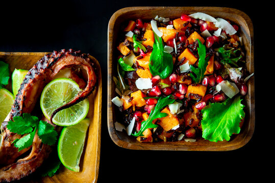 Fried calamari tentacles with lime and side pomegrenade and sweet potatoes salad