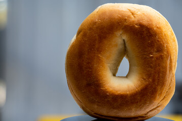 Closeup toasted bagel focus in center of hole