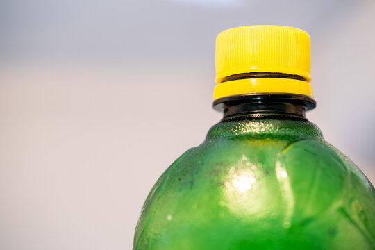 Green Bottle With Yellow Cap