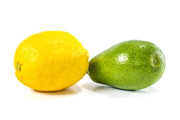 avocado and lemon on white background. food concept