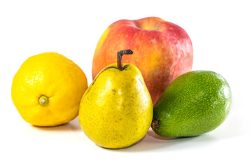 pears apples avocado and lemon on white background. food concept. close-up