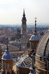 Aerial cityscape view on the roofs and spires of basilica of Our Lady in Zaragoza city in Spain