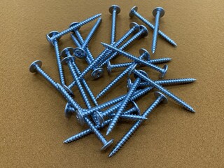 Self-tapping screws on metal of silver color