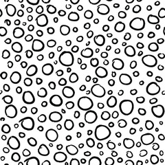 Vector seamless pattern with hand drawn circles. Black and white Illustration for package, textile or menu design. 