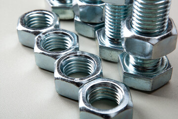 nuts screws fastening materials a lot in a row
