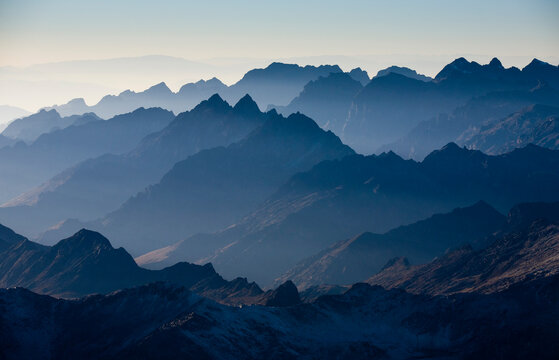 The view from three quarters of the way up Mt. Huayna Potosi as the morning begins to light the valleys behind the  Cordillera Real, Bolivia.      