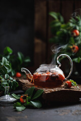 Rosehip tea with rosehip berries. Rosehip tea kettle