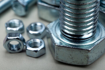 steel nuts and a large bolt closeup