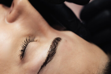 eyebrow microblading. Model's eyebrow close-up. Macro photography