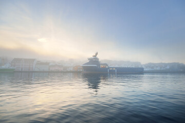 Modern offshore supply ship moored to a pier. Stavanger embankment, Norway. Transportation,...