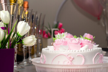festive table with champagne and cake