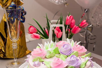 festive table with champagne and cake