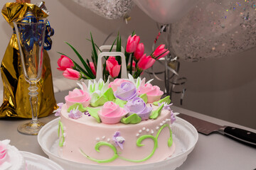 festive table with champagne and cake