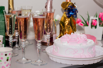 festive table with champagne and cake