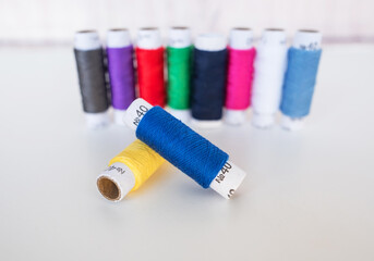  threads for sewing on a white background.