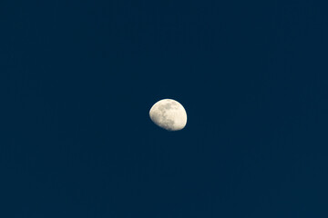 moon in the evening before the sun goes down.
